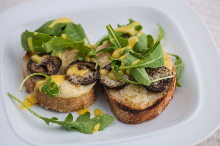 Grilled pear and pickled walnuts with cheddar on toast