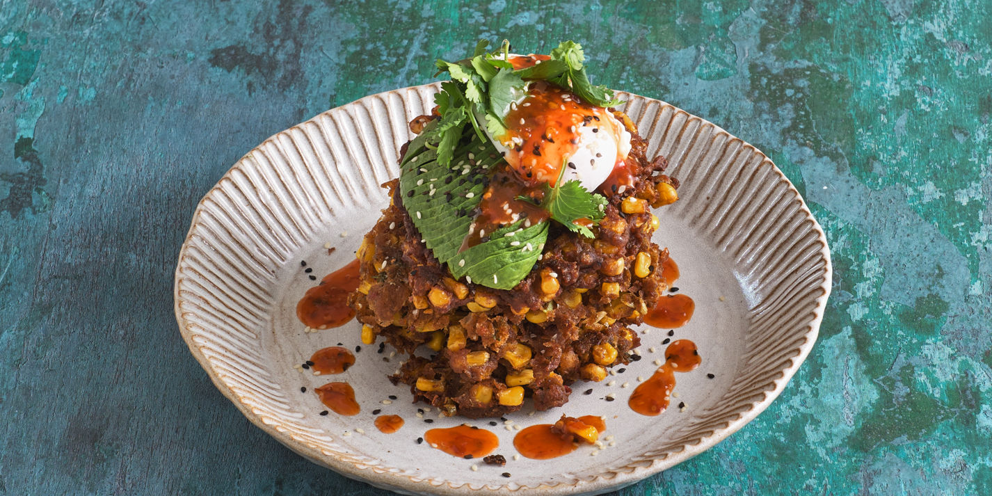 Jerk-Spiced Sweetcorn Fritters with a Poached Egg and Avocado - Great British Chefs
