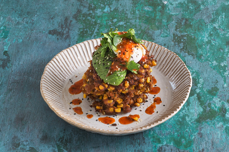 Jerk-spiced sweetcorn fritters with a poached egg and avocado