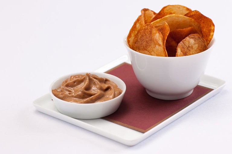 Handmade crisps with a balsamic vinegar foam