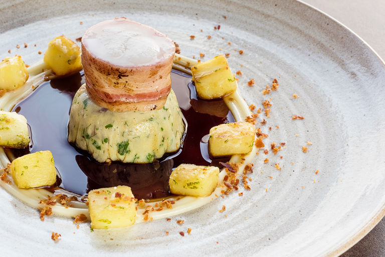 'Two tails' - monkfish and ox tail, herb pancake, smoked bacon and parsnip