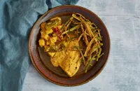 Kerala-style sea bream and potato traybake with tangy okra “chips”