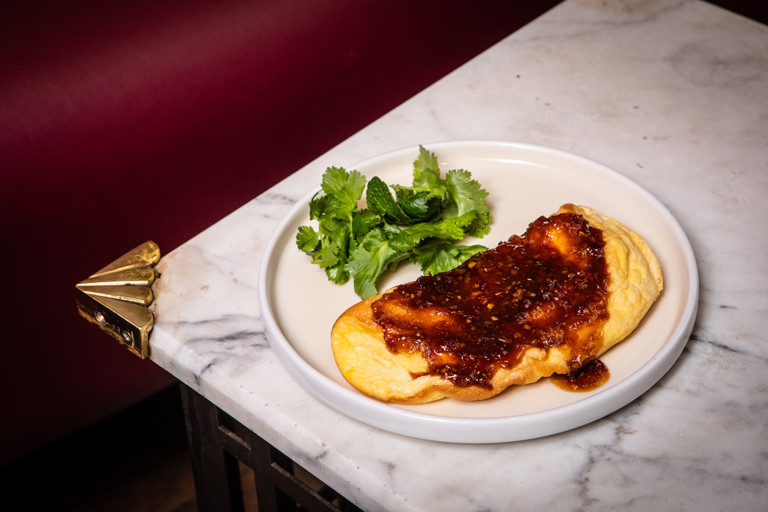 Duck egg omelette soufflé with chilli and oyster sauce jam