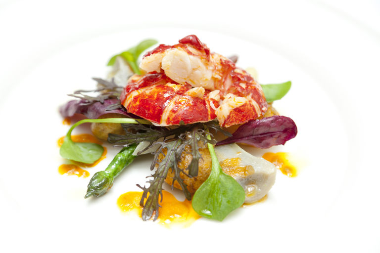 Warm salad of lobster with black truffle oil