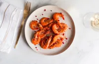 Sweet and sour prawns with ginger and pink pepper