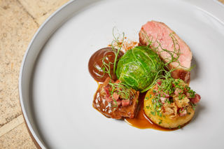 Pork with cabbage, Silesian dumpling and apple