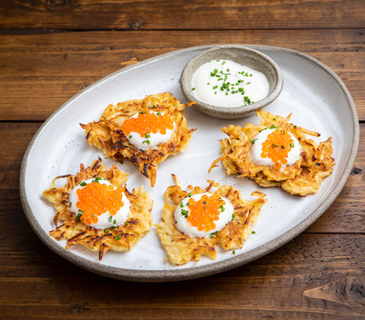 Parsnip latkes with sour cream and trout roe