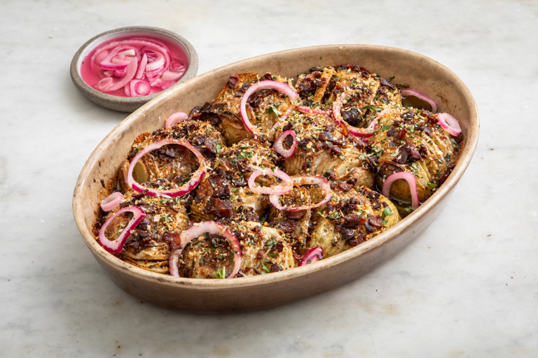 The crispiest hasselback roasted potatoes with taleggio and Scotch bonnet gravy 