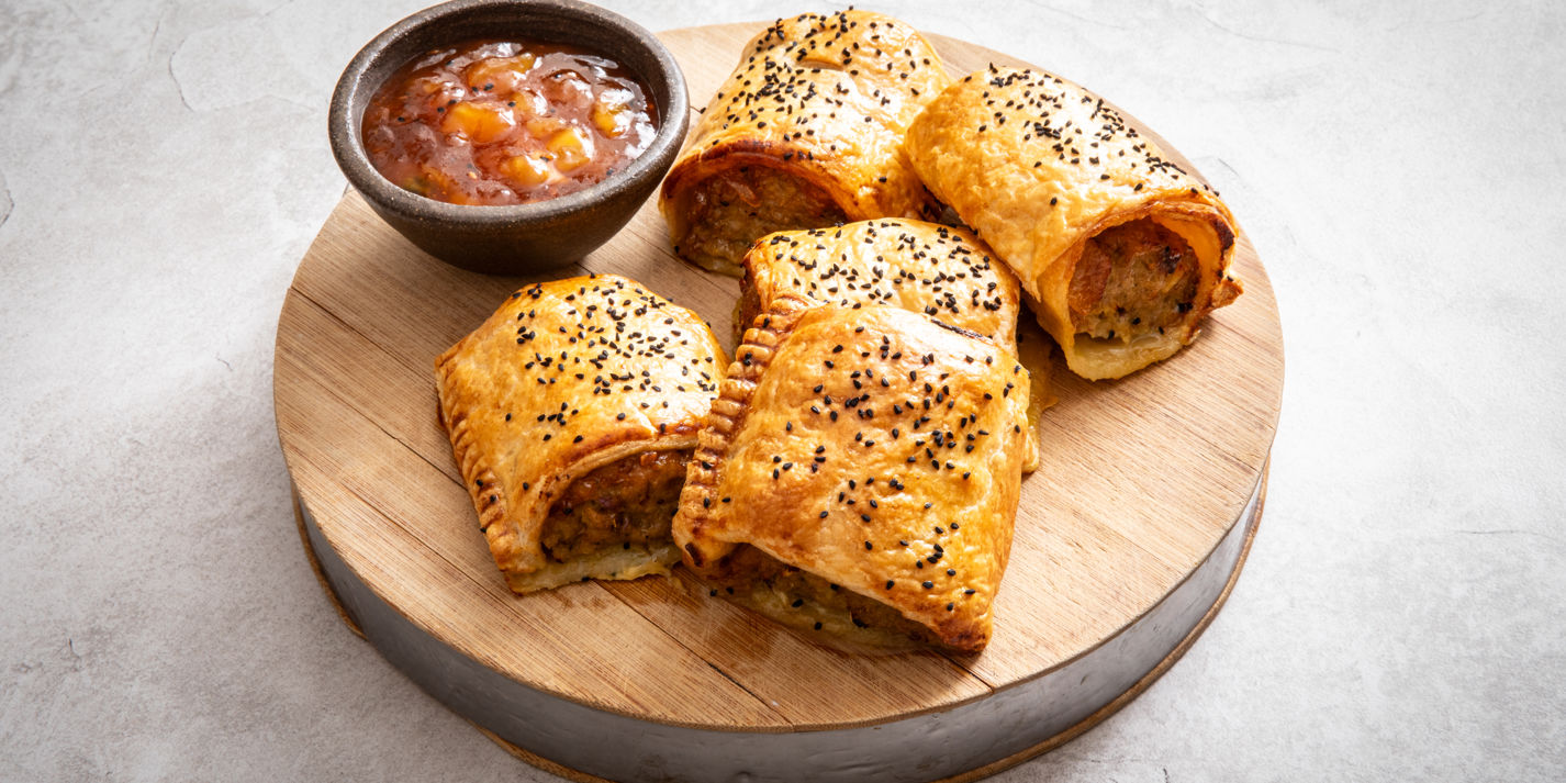 Goan-inspired sausage rolls with mango chutney