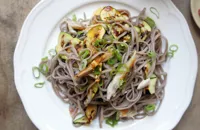 Soba salad with hot smoked mackerel, spring onions, courgettes
