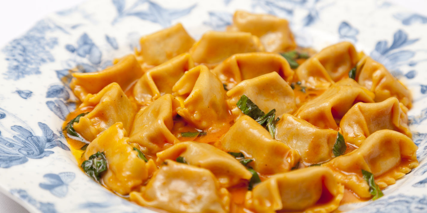 Agnolotti pappa al pomodoro with basil, plated