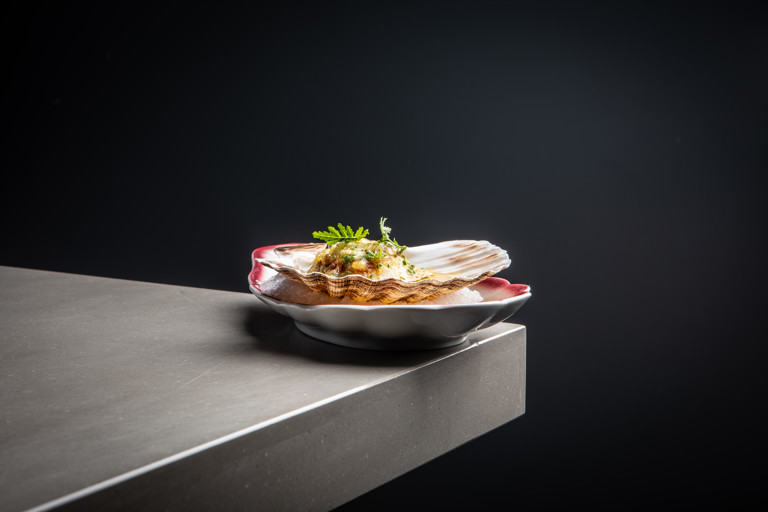 Coal-roasted scallop with sheep’s cheese, Great White tomato and brown butter