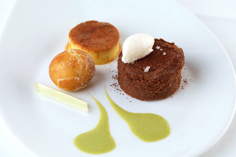 Salted chocolate délice with crème caramel and an apple fritter