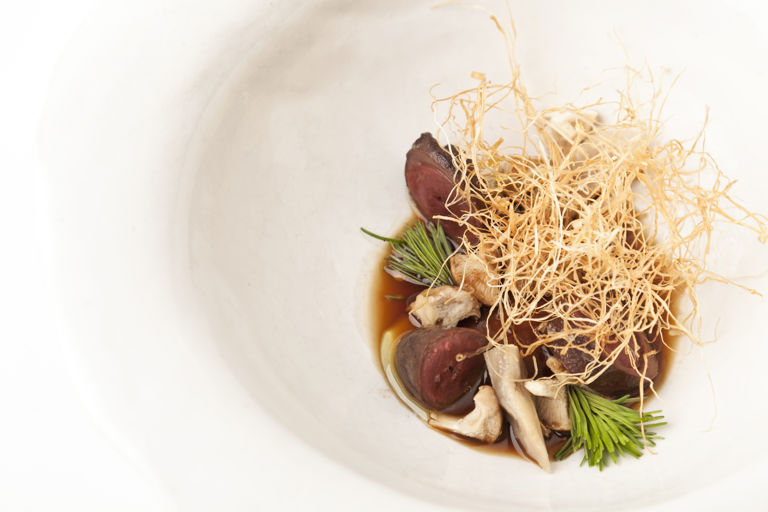Duck hearts with mushroom floss and spiced broth
