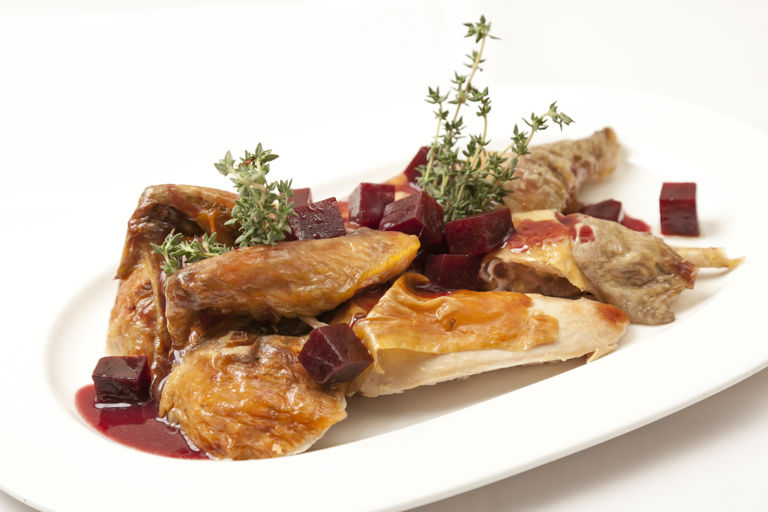 Roasted guinea fowl with beetroot, ginger and thyme