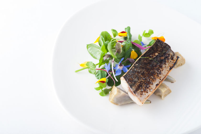 Artichoke cooked sous vide with flamed mackerel