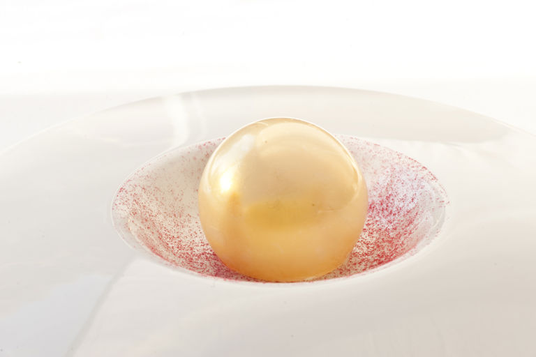Sphere of Pandoro semifreddo with white chocolate mousse
