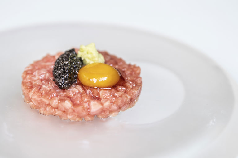 Toro tuna tartare with soy-cured quail egg, caviar and wasabi