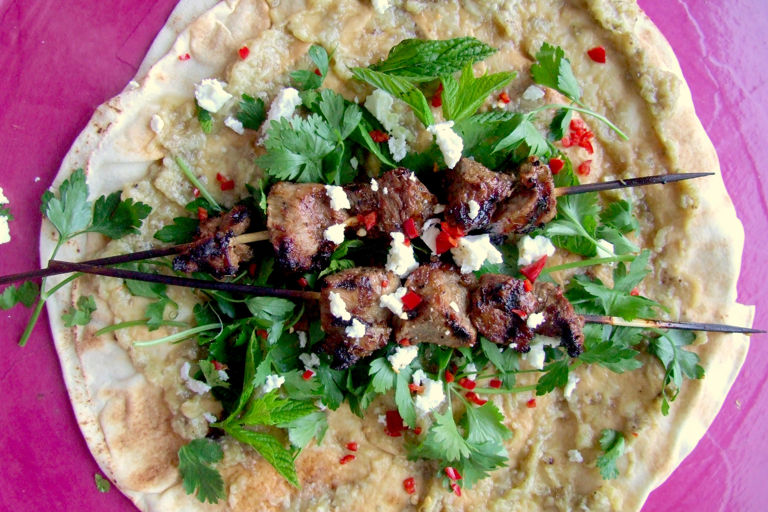 Barbecued lamb, smoky aubergine and feta wraps 