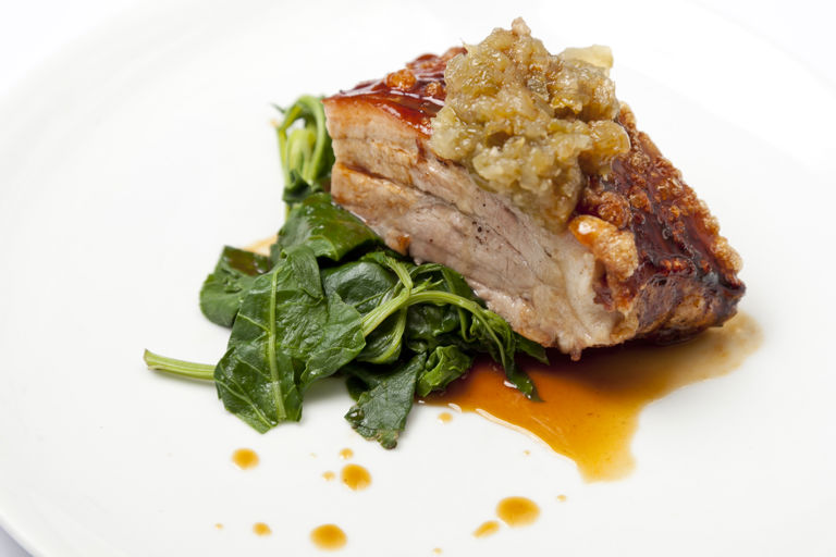 Slow-roast pork belly with green pepper relish