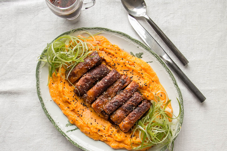 Crispy pork belly and pumpkin mash dusted with black sesame 