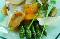 Sauté of Jersey Royals with fried duck egg and griddled asparagus and Parmesan salad