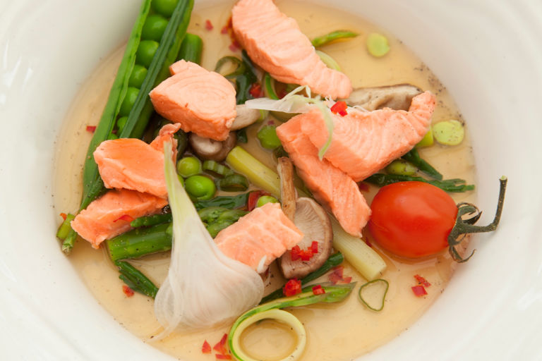Poached Fjord Trout in asparagus, garlic and ginger broth