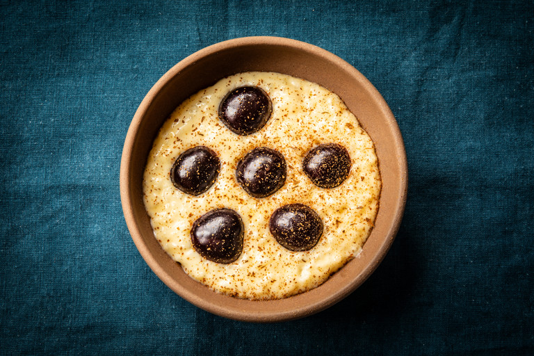 Arroz con leche (rice pudding) with cherries and rompope (eggnog)