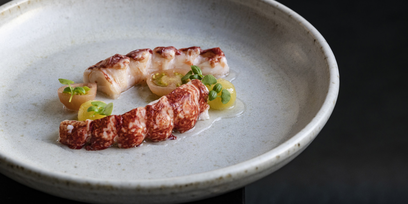 Poached Native Lobster Tail with Marinated Tomatoes and Tomato Consommé