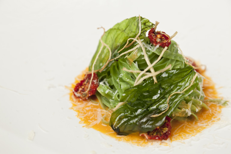 Buttered basil linguine with tomato and chilli sauce and cheddar sauce
