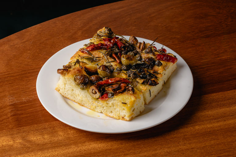 Focaccia with olives, capers and piri piri peppers