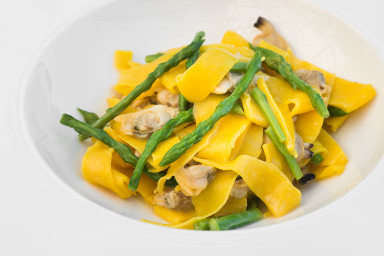 Maltagliati pasta with clams and wild asparagus