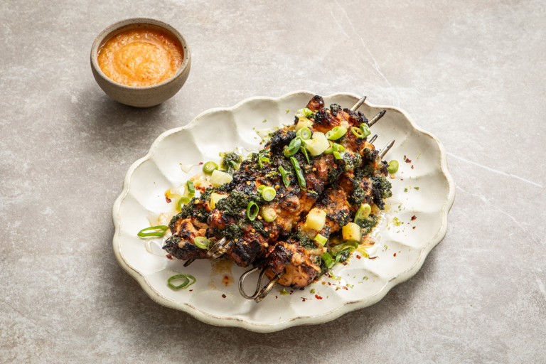 Charred chicken skewers with fermented pineapple hot sauce