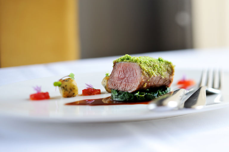 Best end of new season lamb with a pine nut and wild garlic crust and tarragon gnocchi