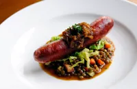 Toulouse sausage with braised lentils