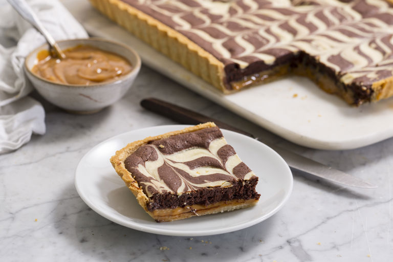 Millionaires' marbled chocolate tart