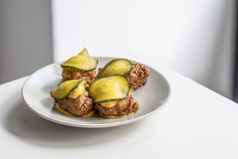 Fried chicken, fermented honey, chilli mayonnaise and pickled cucumber