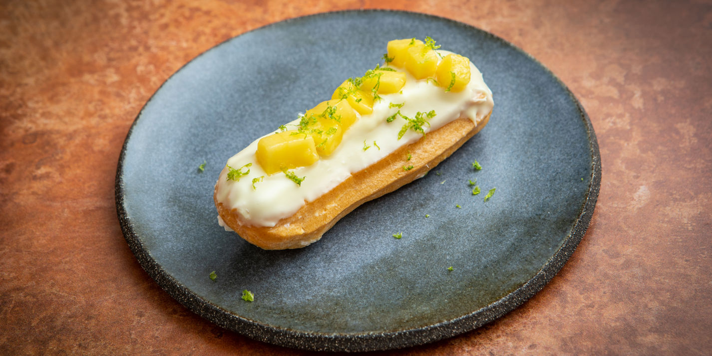 image of Mango, White Chocolate and Makrut Lime Leaf Cream Éclairs recipe by Great British Chefs image of Mango, White Chocolate and Makrut Lime Leaf Cream Éclairs recipe by Great British Chefs
