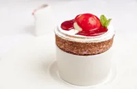 Raspberry soufflé with buttermilk ice cream and raspberry and mint coulis
