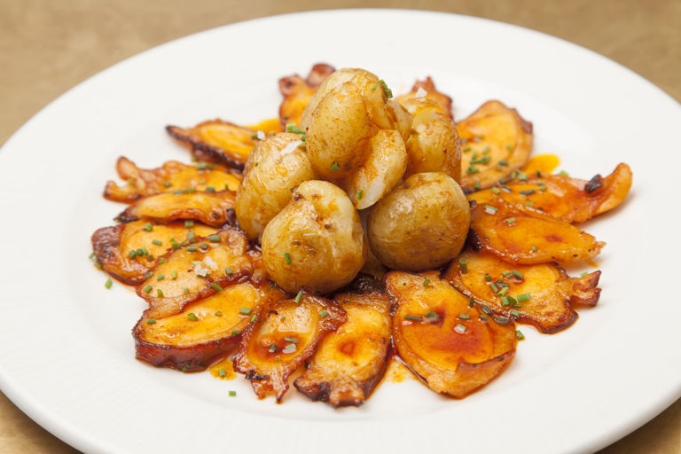 Octopus with baby potatoes, pimentón and olive oil