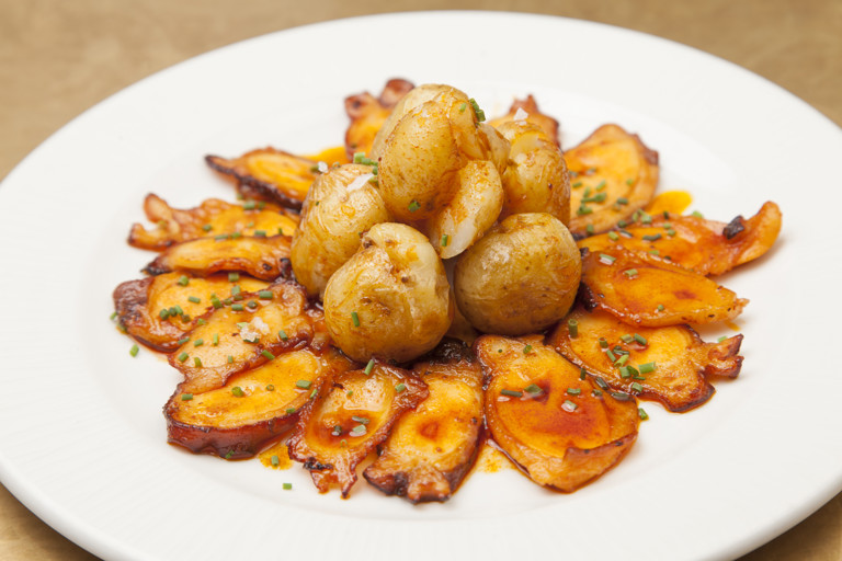 Octopus with baby potatoes, pimentón and olive oil