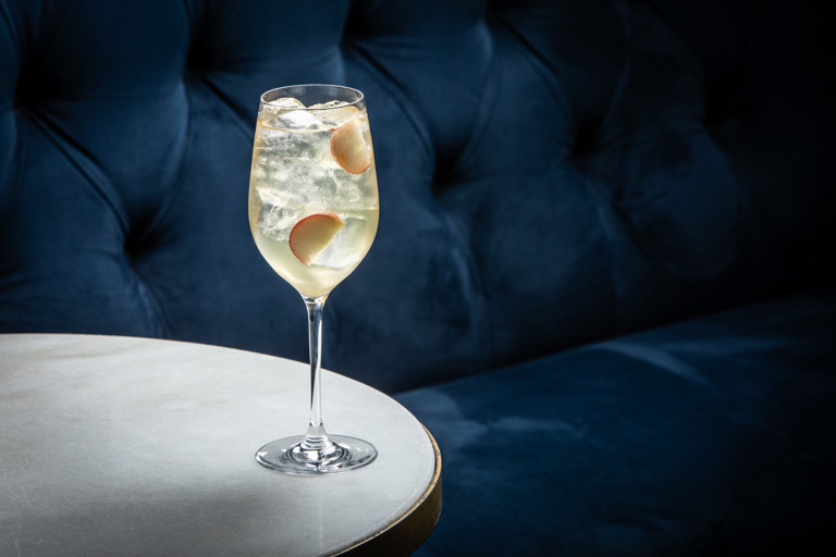 Peach and basil spritz