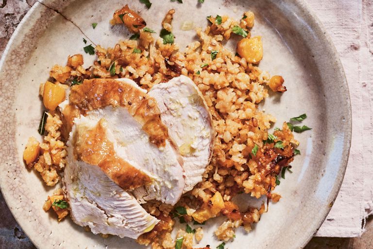 Roast chicken with orange, cumin and apricot rice