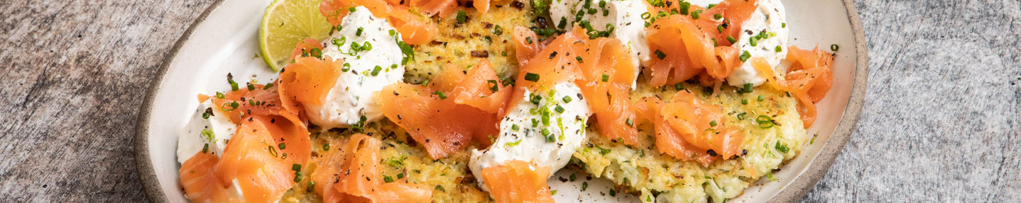 Rice fritters with chive cream, smoked salmon and lime zest