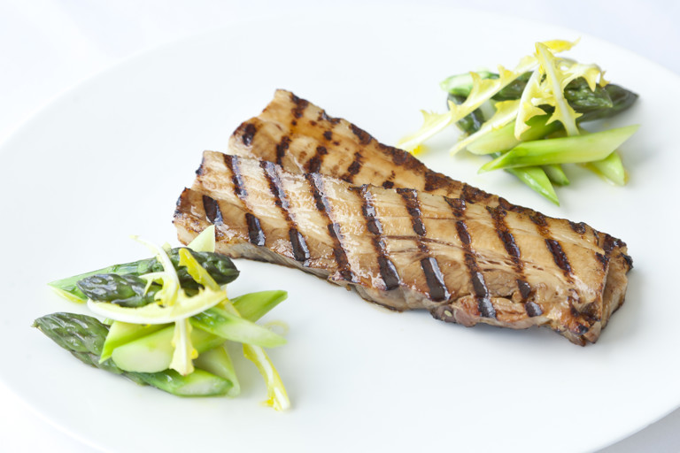 Barbecued Meantime Pilsner-marinated free-range pork belly with English asparagus salad