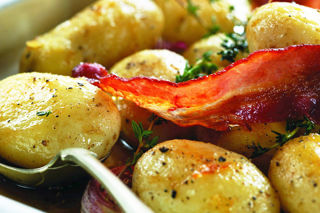 Maple syrup glazed new potato salad with crispy Pancetta and squid