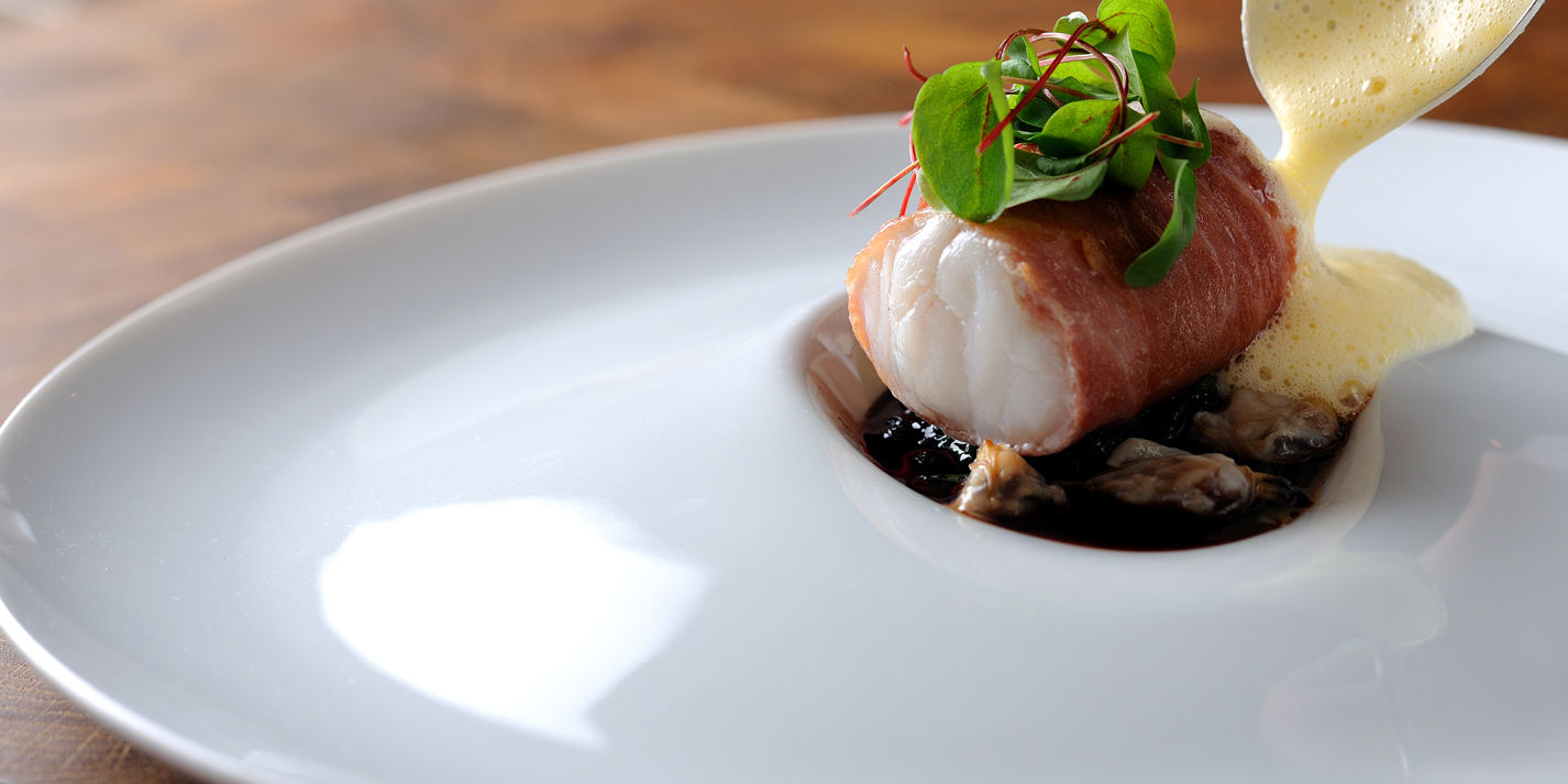 Sous Vide Monkfish Wrapped In Parma Ham With Cockles - Great British Chefs