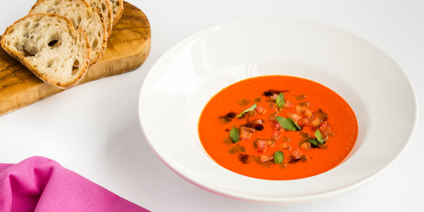 Spicy tomato soup with basil oil