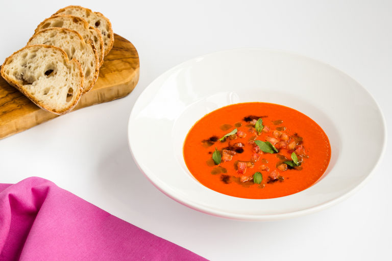 Spicy tomato soup with basil oil