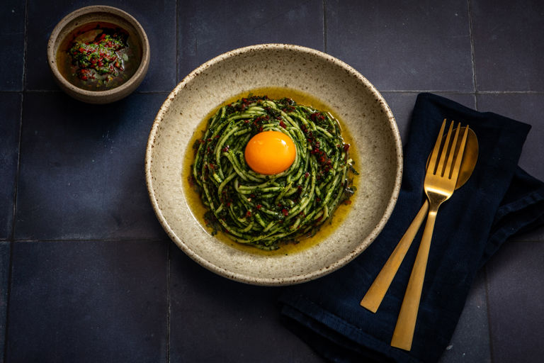  Green spaghetti with golden egg yolk and chilli gremolata